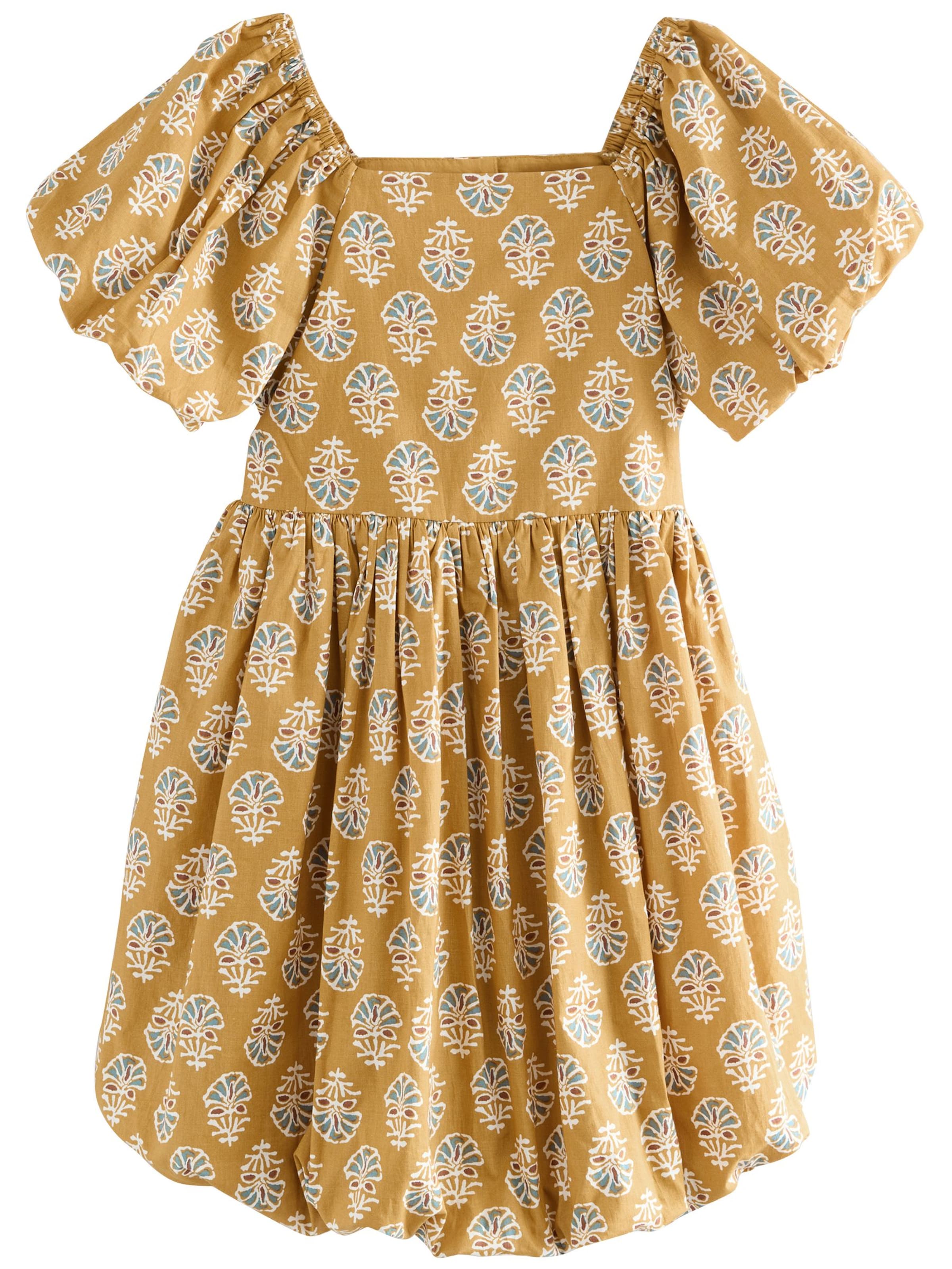 Next Klänning i gul: framsida