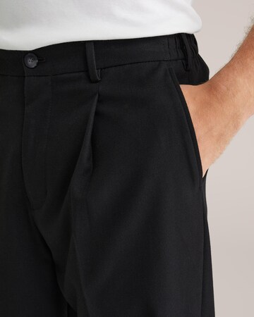 WE Fashion Loose fit Pleat-Front Pants in Black