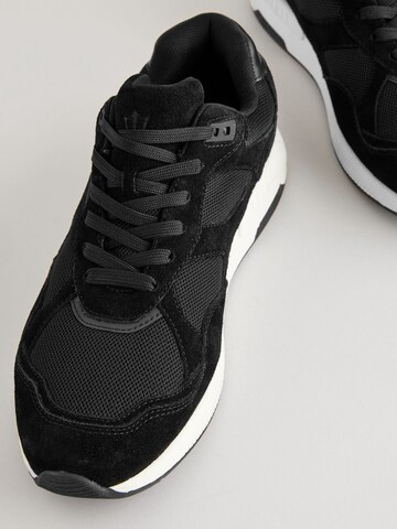 Baskets basses Next en noir