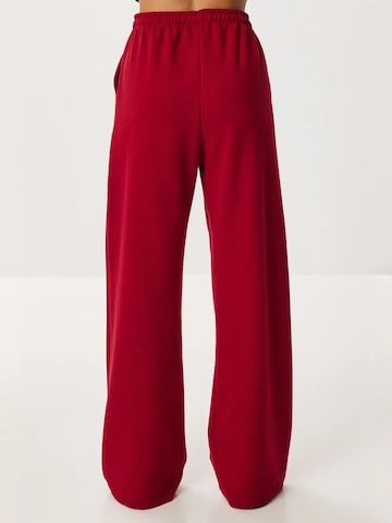 Wide leg Pantaloni 'Hose' di Happiness İstanbul in rosso