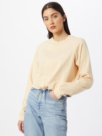 ABOUT YOU x GNTM Sweatshirt 'Xenia' in Beige: front