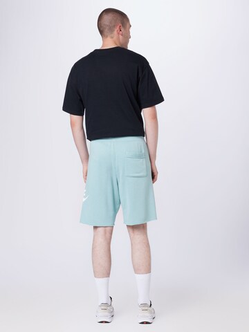 Nike Sportswear Loose fit Trousers 'Club Alumini' in Blue