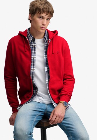 Veste de survêtement 'ESSENTIAL' Superdry & Co en rouge