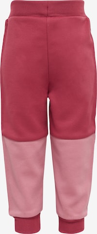 Effilé Pantalon de sport 'Olek' Hummel en rouge