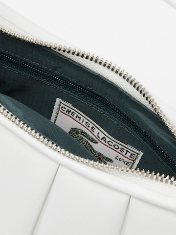LACOSTE Skuldertaske i hvid