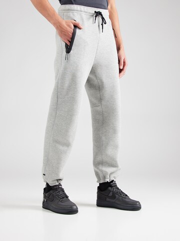 Nike Sportswear Конический (Tapered) Штаны 'TECH FLEECE' в Серый: спереди