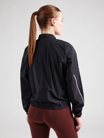 Reebok Training jacket in Black