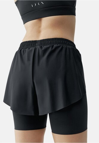 Born Living Yoga Skinny Sports trousers 'Bikila' in Black