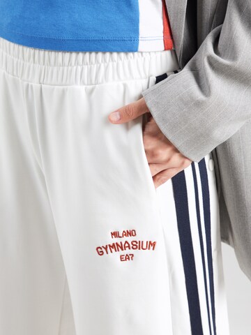 EA7 Emporio Armani Loose fit Trousers 'TRAIN CLUB HOUSE' in White