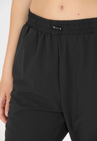 Athlecia Tapered Outdoorbroek 'Amisa V2' in Zwart