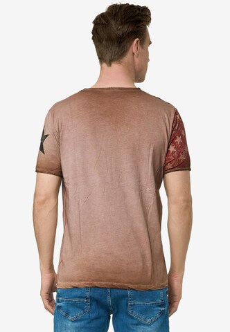 Rusty Neal Cooles T-Shirt mit V-Ausschnitt in Braun