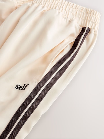 Wide leg Pantaloni di self. in beige