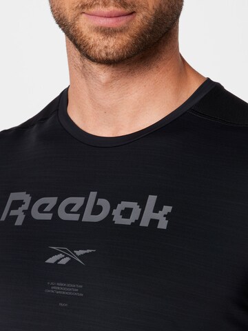 ReebokTehnička sportska majica - crna boja