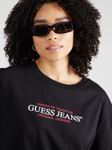 Maglietta di GUESS JEANS in nero