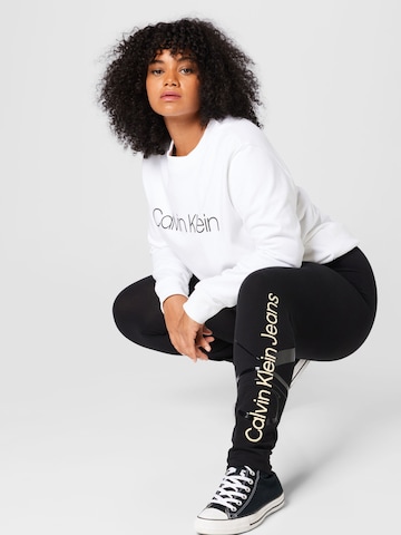 Skinny Leggings de la Calvin Klein Jeans Curve pe negru