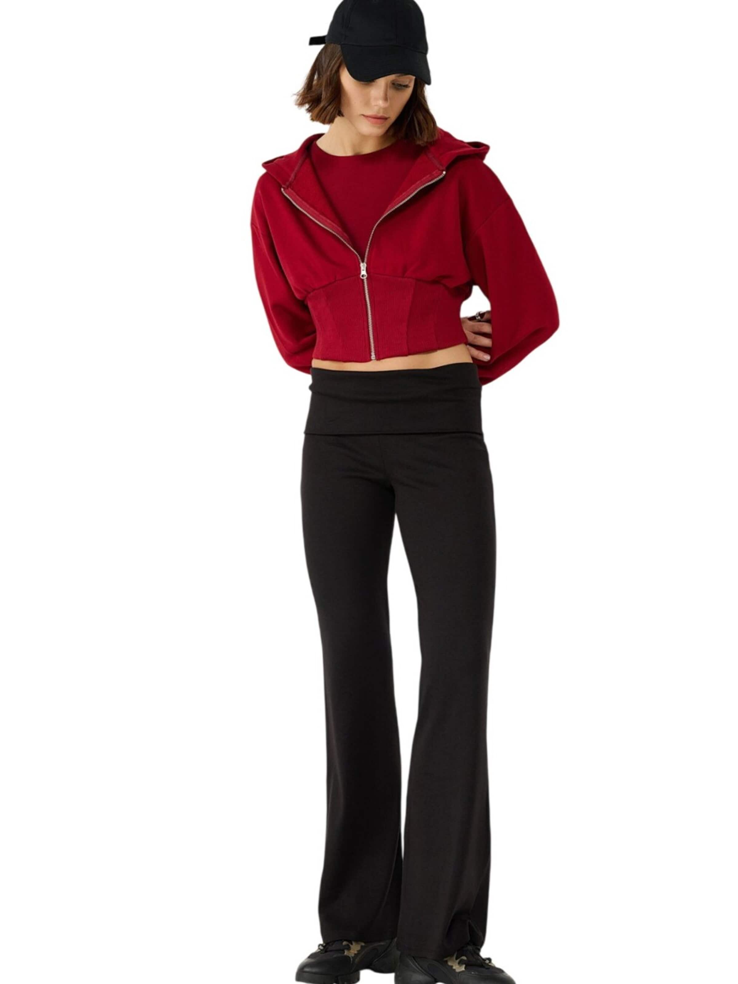 Alexa Dash Flared Trousers in Black: front