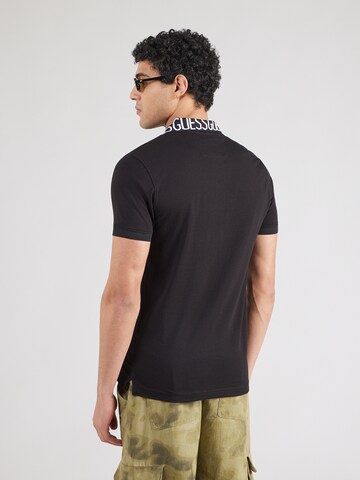 GUESS Koszulka 'NOLAN' w kolorze czarny
