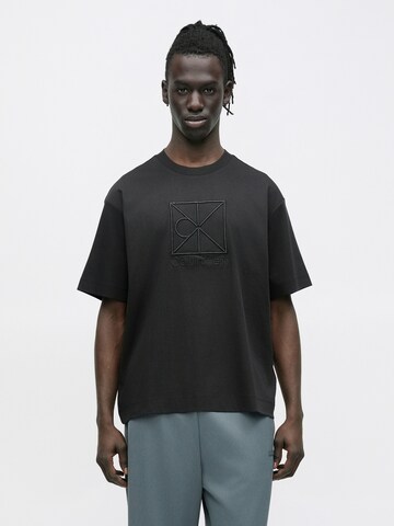 T-Shirt Calvin Klein en noir : devant