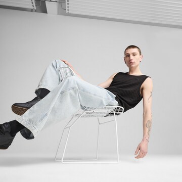 PUMA Funktionsshirt 'Essentials' in Schwarz