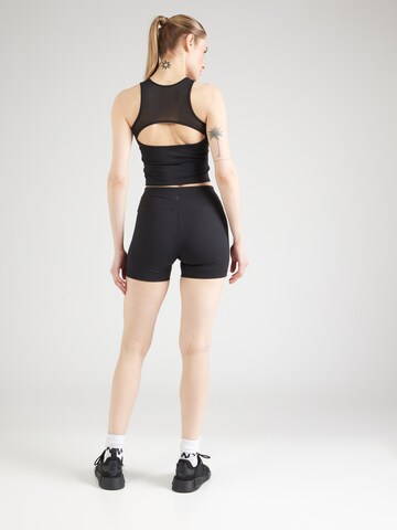 Skinny Pantaloni sportivi di Champion Authentic Athletic Apparel in nero