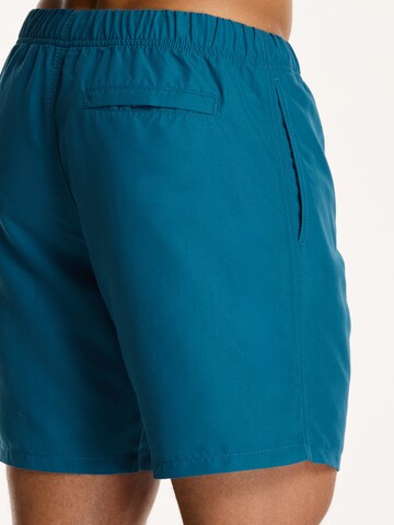 Shiwi Plavecké šortky 'Mike' – modrá