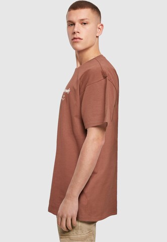 Merchcode T-Shirt 'Just Start' in Braun