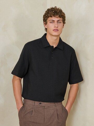 Next Poloshirt in Schwarz: Vorderseite