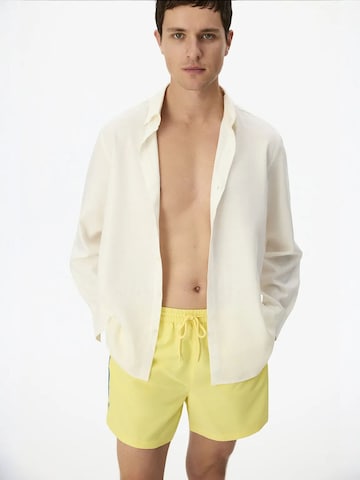 Penti Rövid fürdőnadrágok 'PENTI Herren Badeshorts Opposite Line' - sárga: elől
