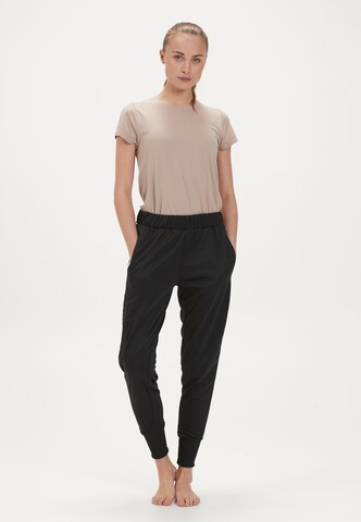 Athlecia Slim fit Workout Pants 'Sella' in Black