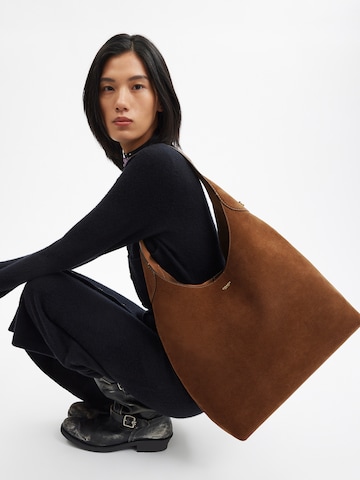 COACH Наплечная сумка в Коричневый