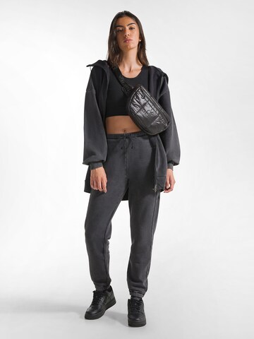 DEHA Slim fit Trousers in Black: front