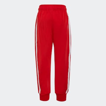 ADIDAS ORIGINALS - Ropa para correr 'Adicolor Sst' en rojo