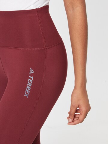 ADIDAS TERREX Skinny Outdoorové kalhoty – červená