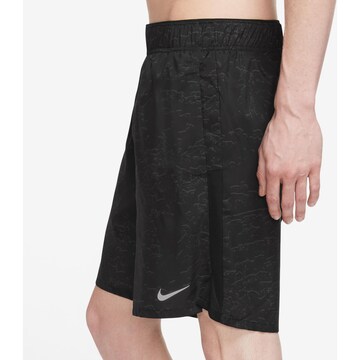 NIKE Regular Workout Pants 'Challenger' in Black