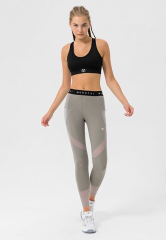 Skinny Pantaloni sportivi 'Naka' di MOROTAI in grigio