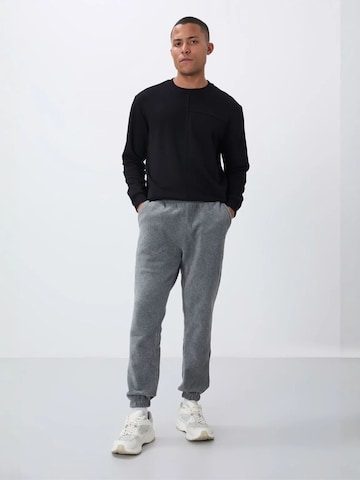 Tapered Pantaloni di Tommy Life in grigio
