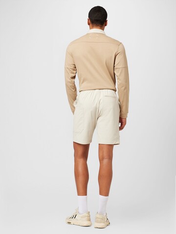 Regular Pantalon de sport ADIDAS GOLF en blanc