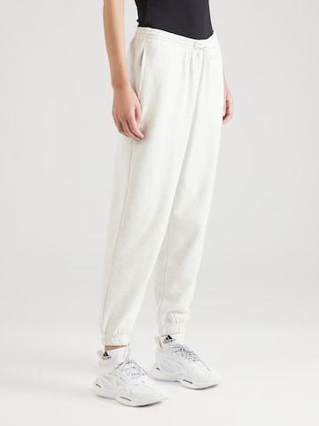 Effilé Pantalon de sport Reebok en blanc : devant