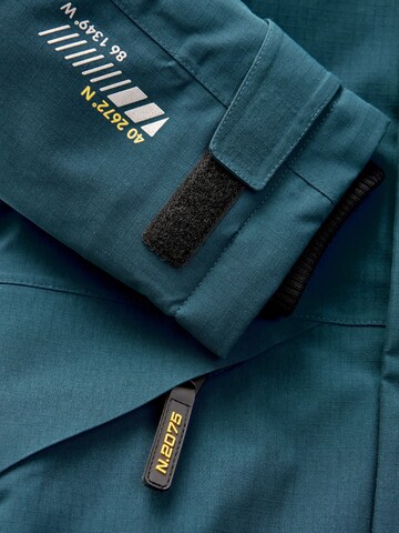Next - Chaqueta funcional en azul