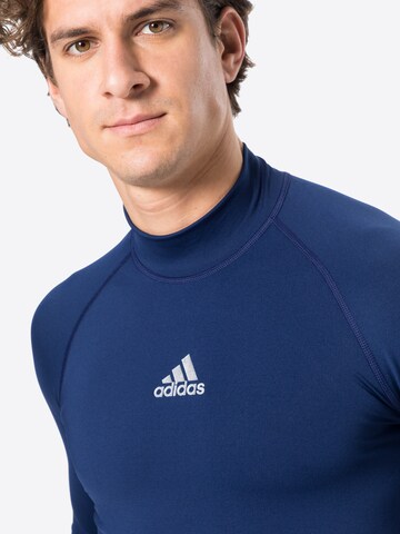 ADIDAS SPORTSWEAR - Camiseta funcional en azul