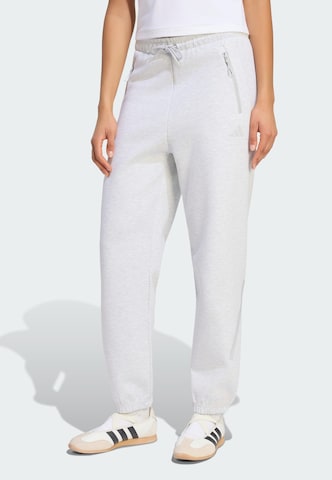 ADIDAS SPORTSWEAR - Tapered Calças de desporto 'Z.N.E.' em cinzento: frente