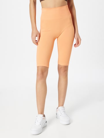 The Jogg Concept Skinny Leggings in Oranje: voorkant