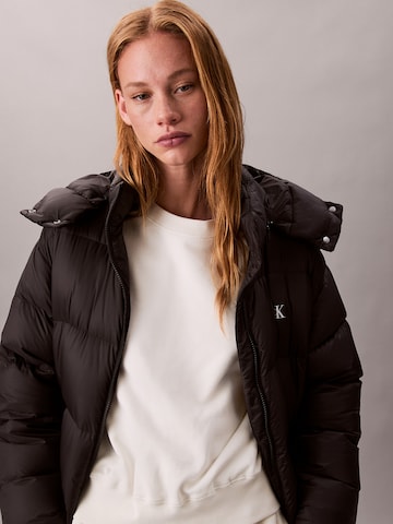 Calvin Klein Jeans Télikabátok 'ESSENTIAL' - fekete