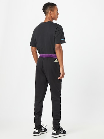 ADIDAS PERFORMANCE Tapered Workout Pants 'DAME 8' in Black