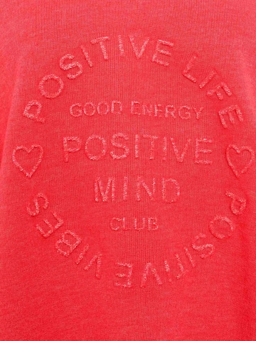 Zwillingsherz Pullover 'Positive Mind' i rød