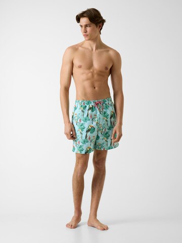 GUESS Board Shorts in Green: front