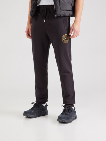 Tapered Pantaloni di Versace Jeans Couture in nero: frontale