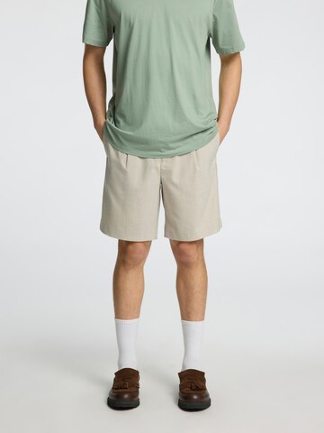 SELECTED HOMME Regular Pleat-front trousers 'SLHLeroy' in Beige: front