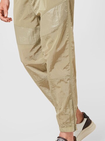 Calvin Klein Jeans Zwężany krój Spodnie w kolorze zielony
