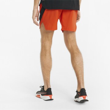 PUMA Regular Sportbroek in Oranje